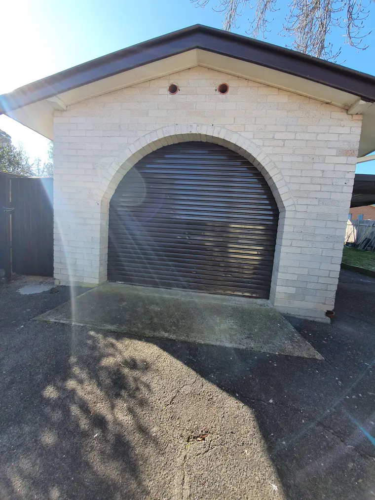 Arched garage door after repainting