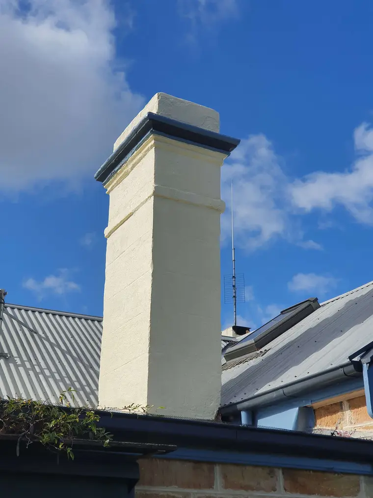 Rendered chimney after preparation and repainting