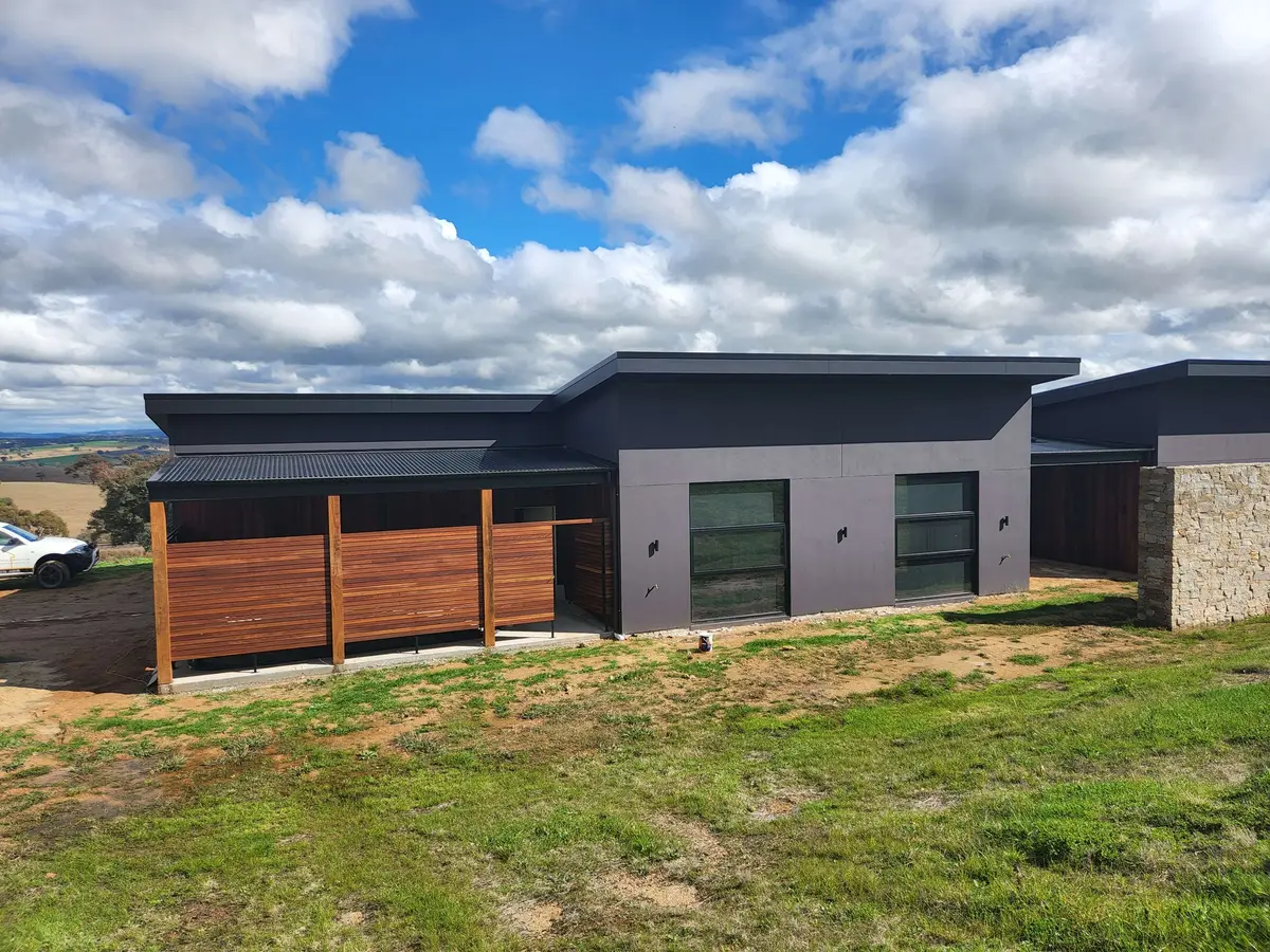 Completed contemporary country home exterior