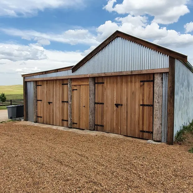 Finished timber doors on a country shed