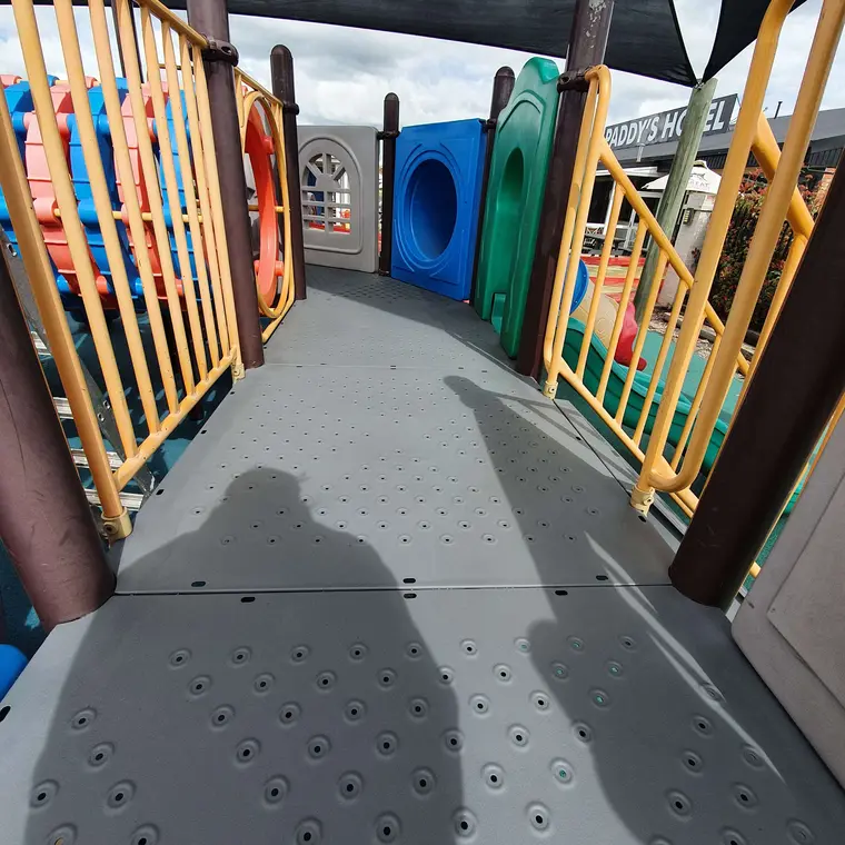 Playground platform after commercial repainting in grey