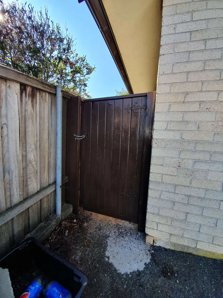 Timber gate after restoration and coating