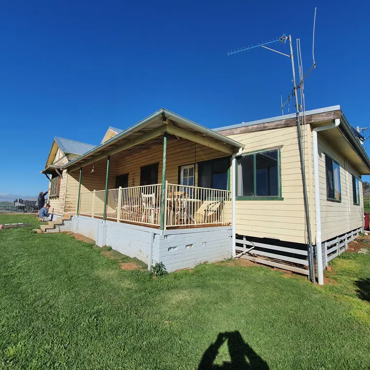 Weathered country home verandah before exterior restoration
